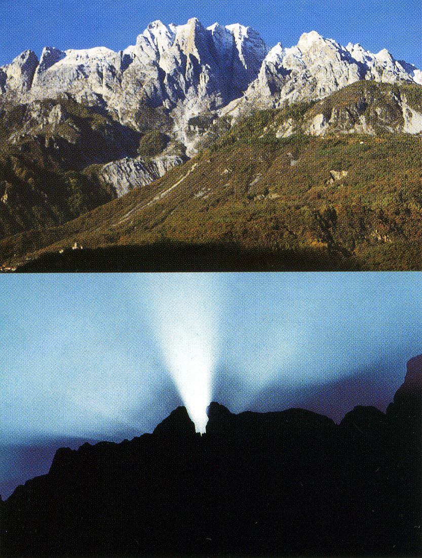 Monte Conarena at the equinox sunset, with a shaft of light from the summit