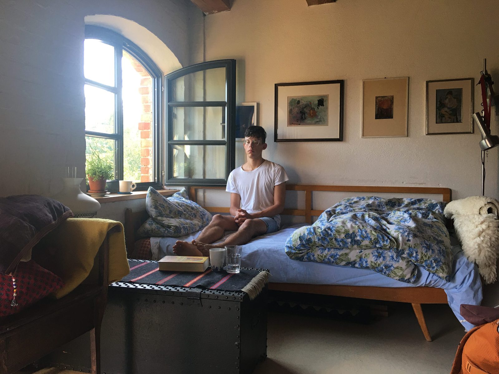 A person sitting in meditation, Brandenburg 2020